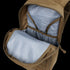 The Condor Fuel Hydration Backpack 18L in tan features a light blue interior with multiple pockets and compartments for organized gear storage.